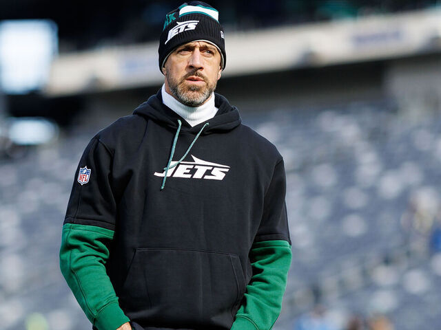 EAST RUTHERFORD, NEW JERSEY - DECEMBER 1: Quarterback Aaron Rodgers #8 of the New York Jets stands on the field prior to an NFL football game against the Seattle Seahawks, at MetLife Stadium on December 1, 2024 in East Rutherford, New Jersey.