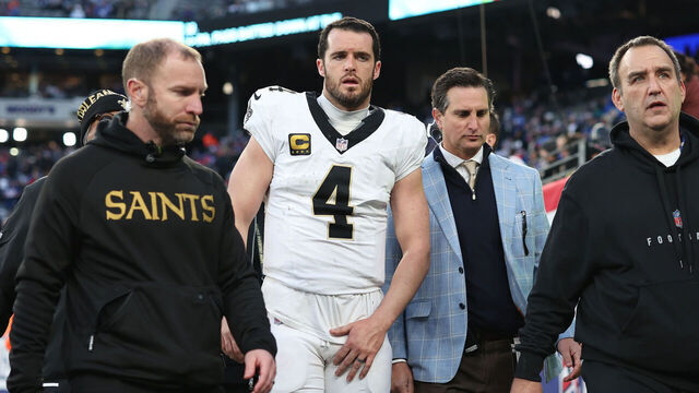 EAST RUTHERFORD, NEW JERSEY - DECEMBER 08: Derek Carr #4 of the New Orleans Saints leaves the field after an apparent injury during the fourth quarter against the New York Giants at MetLife Stadium on December 08, 2024 in East Rutherford, New Jersey.