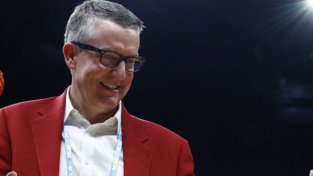 LOS ANGELES, CALIFORNIA - MARCH 30: Athletic director Greg Byrne of the Alabama Crimson Tide cuts the net after the Alabama Crimson Tide defeated the Clemson Tigers 89-82 in the Elite 8 round of the NCAA Men's Basketball Tournament at Crypto.com Arena on March 30, 2024 in Los Angeles, California.