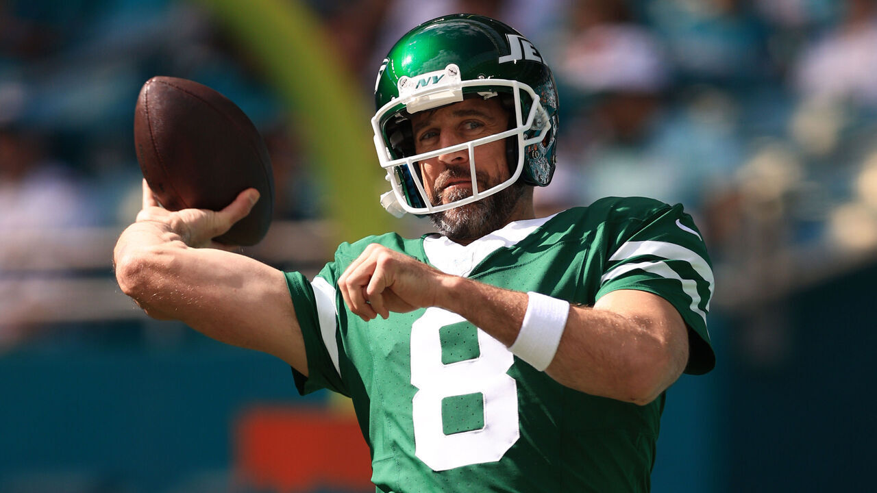 MIAMI GARDENS, FLORIDA - DECEMBER 08: Aaron Rodgers #8 of the New York Jets warms up before a game against the Miami Dolphins at Hard Rock Stadium on December 08, 2024 in Miami Gardens, Florida.