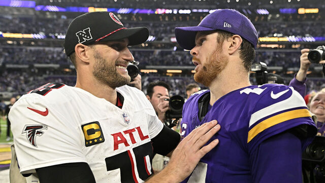 MINNEAPOLIS, MINNESOTA - DECEMBER 08: Kirk Cousins #18 of the Atlanta Falcons talks with Sam Darnold #14 of the Minnesota Vikings after the game at U.S. Bank Stadium on December 08, 2024 in Minneapolis, Minnesota.