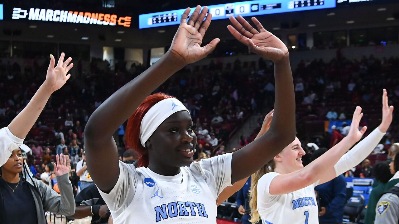 COLUMBIA, SOUTH CAROLINA - MARCH 22: Maria Gakdeng #5 of the North Carolina Tar Heels and teammates wave to the crowd during the first round of the 2024 NCAA Women's Basketball Tournament held at Colonial Life Arena on March 22, 2024 in Columbia, South Carolina.