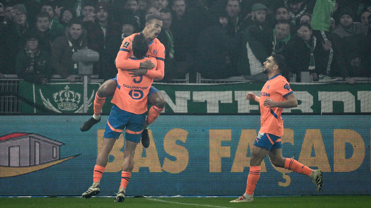Marseille's English forward #10 Mason Greenwood (up) celebrates with his teamates after scoring a goal during the French L1 football match between AS Saint-Etienne (ASSE) and Olympique de Marseille (OM) at Geoffroy Guichard stadium in Saint-Etienne on December 8, 2024.