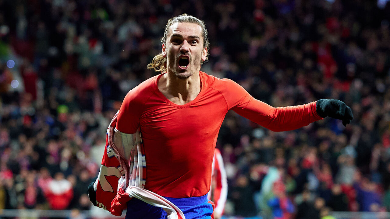 MADRID, SPAIN - DECEMBER 08: Antoine Griezmann of Atletico de Madrid celebrates after scoring their side's fourth goal during the LaLiga match between Atletico de Madrid and Sevilla FC at Riyadh Air Metropolitano on December 08, 2024 in Madrid, Spain.