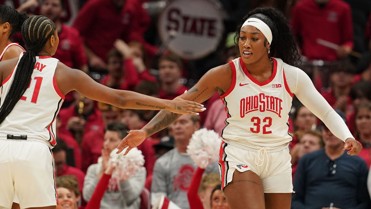 COLUMBUS, OH - DECEMBER 08: Ohio State Buckeyes forward Cotie McMahon (32) celebrates a play with Ohio State Buckeyes guard Chance Gray (21) during the first half of the game between the Ohio State Buckeyes and the Illinois Fighting Illini at Value City Arena in Columbus, Ohio On December 8, 2024.