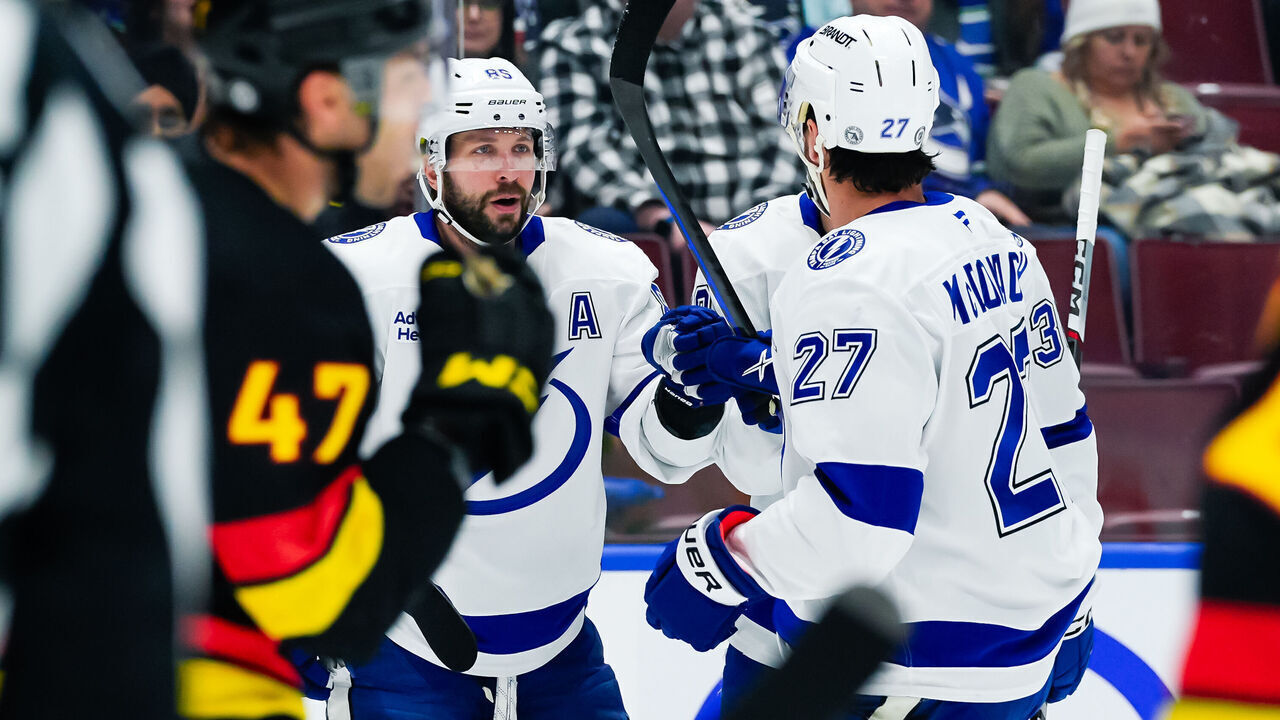 VANCOUVER, CANADA - DECEMBER 8: Nikita Kucherov #86 of the Tampa Bay Lightning is congratulated after scoring a goal against the Vancouver Canucks during the second period of their NHL game at Rogers Arena on December 8, 2024 in Vancouver, British Columbia, Canada.