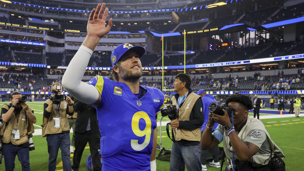 INGLEWOOD, CALIFORNIA - DECEMBER 08: Matthew Stafford #9 of the Los Angeles Rams waves to the crowd after the Rams defeated the Buffalo Bills, 44-42, at SoFi Stadium on December 08, 2024 in Inglewood, California.