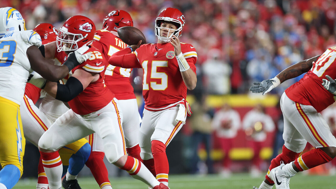 KANSAS CITY, MISSOURI - DECEMBER 08: Patrick Mahomes #15 of the Kansas City Chiefs throws a pass against the Los Angeles Chargers during the first quarter at GEHA Field at Arrowhead Stadium on December 08, 2024 in Kansas City, Missouri.