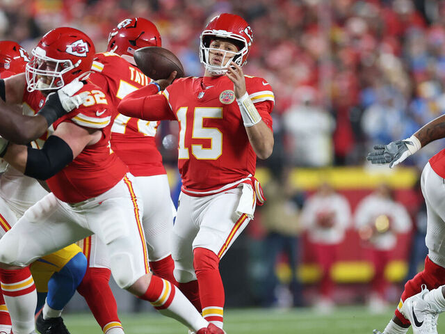 KANSAS CITY, MISSOURI - DECEMBER 08: Patrick Mahomes #15 of the Kansas City Chiefs throws a pass against the Los Angeles Chargers during the first quarter at GEHA Field at Arrowhead Stadium on December 08, 2024 in Kansas City, Missouri.