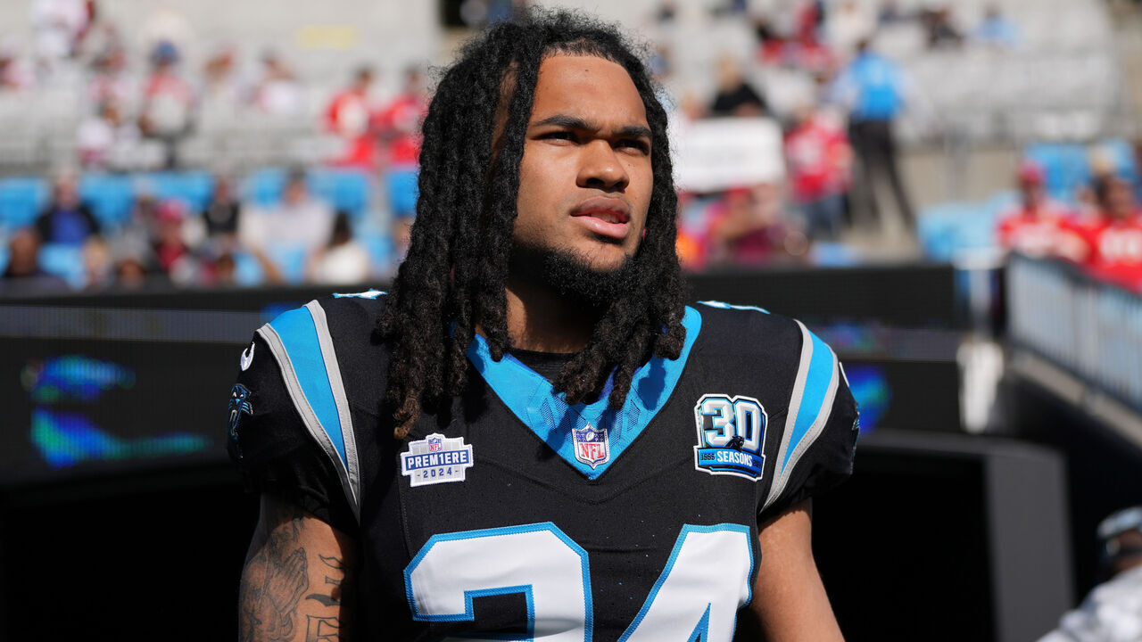 CHARLOTTE, NORTH CAROLINA - NOVEMBER 24: Jonathon Brooks #24 of the Carolina Panthers takes the field prior to a game against the Kansas City Chiefs at Bank of America Stadium on November 24, 2024 in Charlotte, North Carolina.