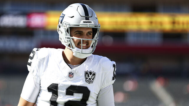 TAMPA, FLORIDA - DECEMBER 8: Aidan O'Connell #12 of the Las Vegas Raiders smiles prior to an NFL football game against the Tampa Bay Buccaneers at Raymond James Stadium on December 8, 2024 in Tampa, Florida.