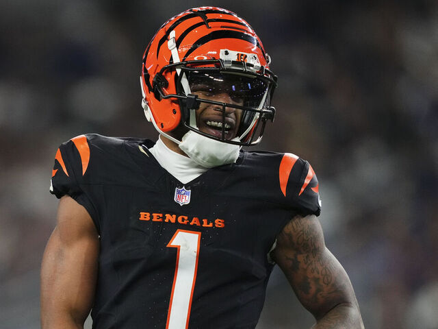 ARLINGTON, TX - DECEMBER 09: Ja'Marr Chase #1 of the Cincinnati Bengals reacts after a play against the Dallas Cowboys during the first half of an NFL football game at AT&T Stadium on December 9, 2024 in Arlington, Texas.