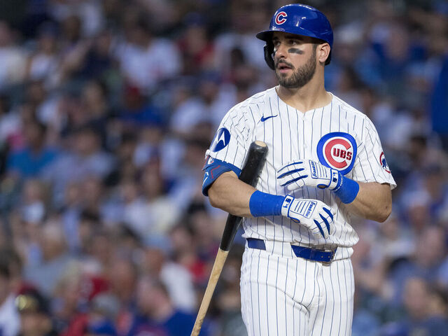 CHICAGO, ILLINOIS - AUGUST 04: Mike Tauchman of the Chicago Cubs bats in a game against the St. Louis Cardinals at Wrigley Field on August 04, 2024 in Chicago, Illinois.