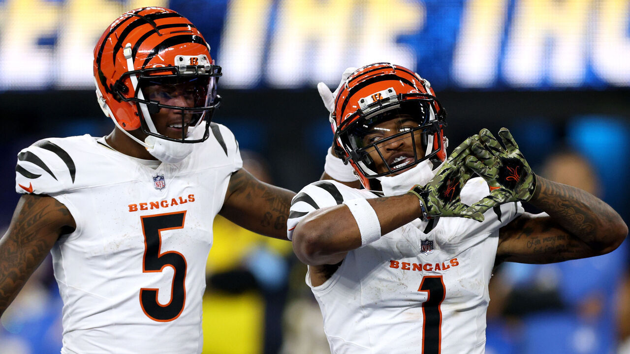 INGLEWOOD, CALIFORNIA - NOVEMBER 17: Ja'Marr Chase #1 of the Cincinnati Bengals celebrates his touchdown with Tee Higgins #5 during a 34-27 loss to the Los Angeles Chargers at SoFi Stadium on November 17, 2024 in Inglewood, California.