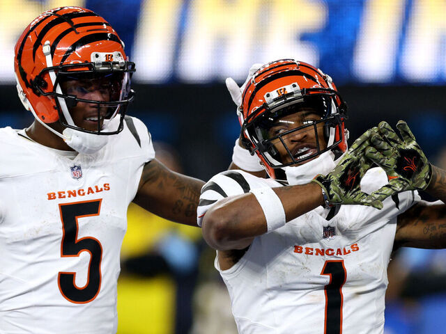 INGLEWOOD, CALIFORNIA - NOVEMBER 17: Ja'Marr Chase #1 of the Cincinnati Bengals celebrates his touchdown with Tee Higgins #5 during a 34-27 loss to the Los Angeles Chargers at SoFi Stadium on November 17, 2024 in Inglewood, California.