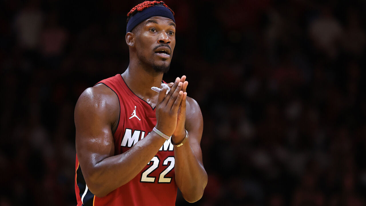MIAMI, FLORIDA - NOVEMBER 26: Jimmy Butler #22 of the Miami Heat reacts against the Milwaukee Bucks during the fourth quarter of the Emirates NBA Cup at Kaseya Center on November 26, 2024 in Miami, Florida.