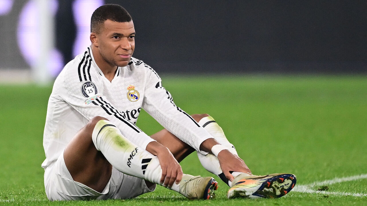 Real Madrid's French forward #09 Kylian Mbappe reacts after an injury during the UEFA Champions League football match between Atalanta and Real Madrid at the Gewiss Stadium in Bergamo, on December 10, 2024.