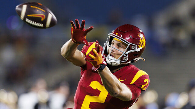 PASADENA, CALIFORNIA - NOVEMBER 23: Duce Robinson #2 of the USC Trojans catches the ball before a game against UCLA Bruins at Rose Bowl on November 23, 2024 in Pasadena, California.