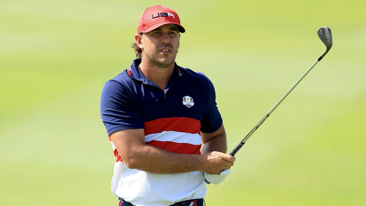 ROME, ITALY - OCTOBER 01: Brooks Koepka of The United States team plays his second shot on the first hole in his match against Ludwig Aberg during the Sunday singles matches of the 2023 Ryder Cup at Marco Simone Golf Club on October 01, 2023 in Rome, Italy.