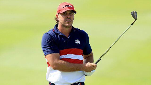 ROME, ITALY - OCTOBER 01: Brooks Koepka of The United States team plays his second shot on the first hole in his match against Ludwig Aberg during the Sunday singles matches of the 2023 Ryder Cup at Marco Simone Golf Club on October 01, 2023 in Rome, Italy.