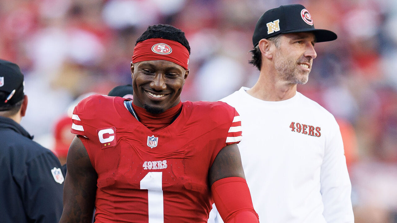 SANTA CLARA, CALIFORNIA - DECEMBER 8: Wide receiver Deebo Samuel Sr. #1 of the San Francisco 49ers interacts with head coach Kyle Shanahan during the first half of an NFL football game against the Chicago Bears, at Levi's Stadium on December 8, 2024 in Santa Clara, California.