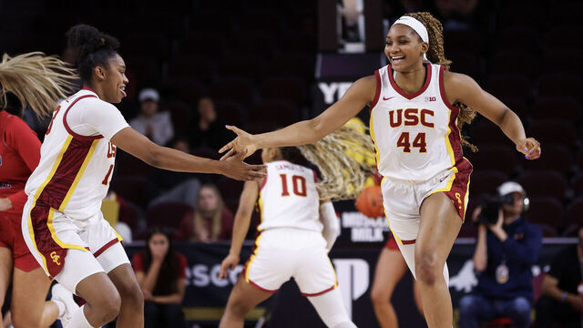 LOS ANGELES, CALIFORNIA - DECEMBER 10: Kiki Iriafen #44 and Rayah Marshall #13 of the USC Trojans celebrate a basket in the first half against the Fresno State Bulldogs at Galen Center on December 10, 2024 in Los Angeles, California.