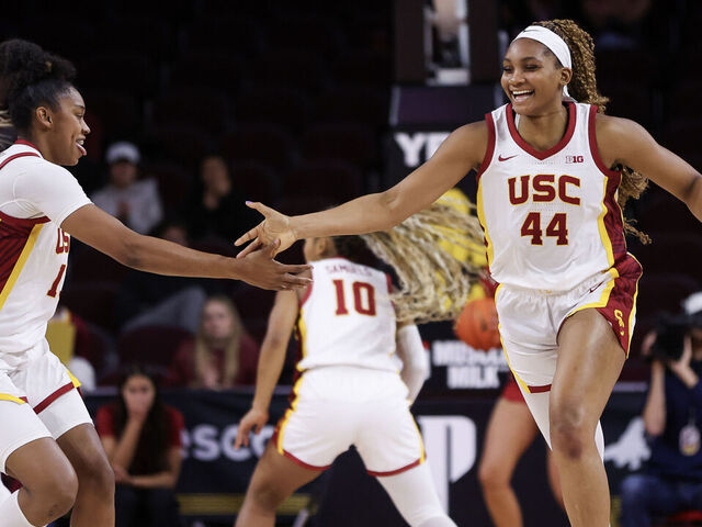 LOS ANGELES, CALIFORNIA - DECEMBER 10: Kiki Iriafen #44 and Rayah Marshall #13 of the USC Trojans celebrate a basket in the first half against the Fresno State Bulldogs at Galen Center on December 10, 2024 in Los Angeles, California.