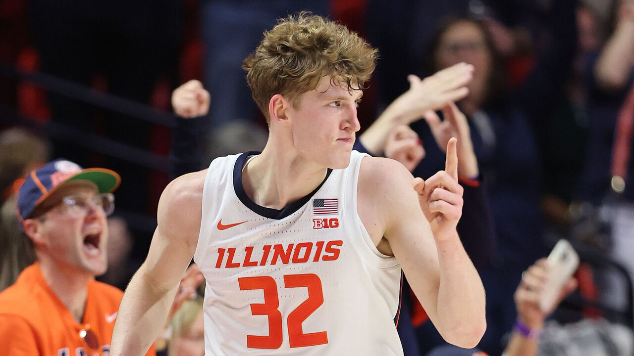 CHAMPAIGN, ILLINOIS - DECEMBER 10: Kasparas Jakucionis #32 of the Illinois Fighting Illini celebrates a basket against the Wisconsin Badgers during the second half at State Farm Center on December 10, 2024 in Champaign, Illinois.