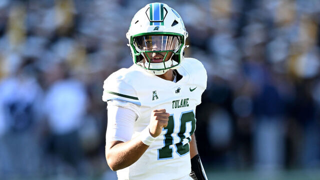 ANNAPOLIS, MARYLAND - NOVEMBER 16: Darian Mensah #10 of the Tulane Green Wave celebrates during the game against the Navy Midshipmen at Navy-Marine Corps Memorial Stadium on November 16, 2024 in Annapolis, Maryland.