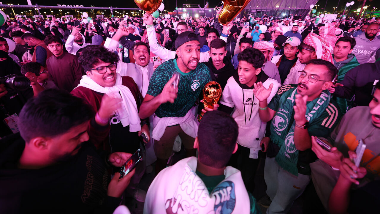 RIYADH, SAUDI ARABIA - DECEMBER 11: Fans celebrate as Saudi Arabia is announced as the host nation for the FIFA World Cup 2034 Host on December 11, 2024 in Riyadh, Saudi Arabia.