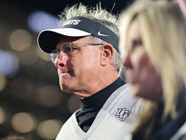 ORLANDO, FLORIDA - NOVEMBER 29: Head coach Gus Malzahn of the UCF Knights walks off the field after a 28-14 loss to Utah Utes at FBC Mortgage Stadium on November 29, 2024 in Orlando, Florida.