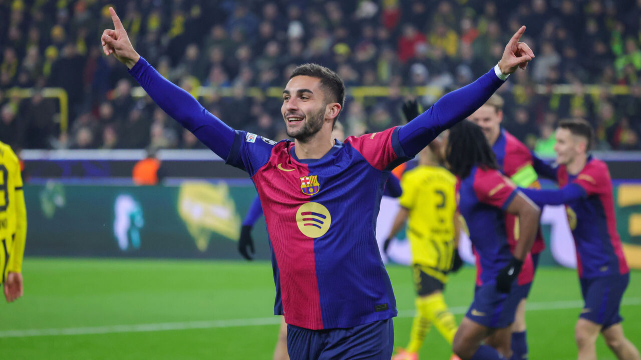 DORTMUND, GERMANY - DECEMBER 11: Ferran Torres of BArcelona celebrates the teams second goal during the UEFA Champions League 2024/25 League Phase MD6 match between Borussia Dortmund and FC Barcelona at BVB Stadion Dortmund on December 11, 2024 in Dortmund, Germany.