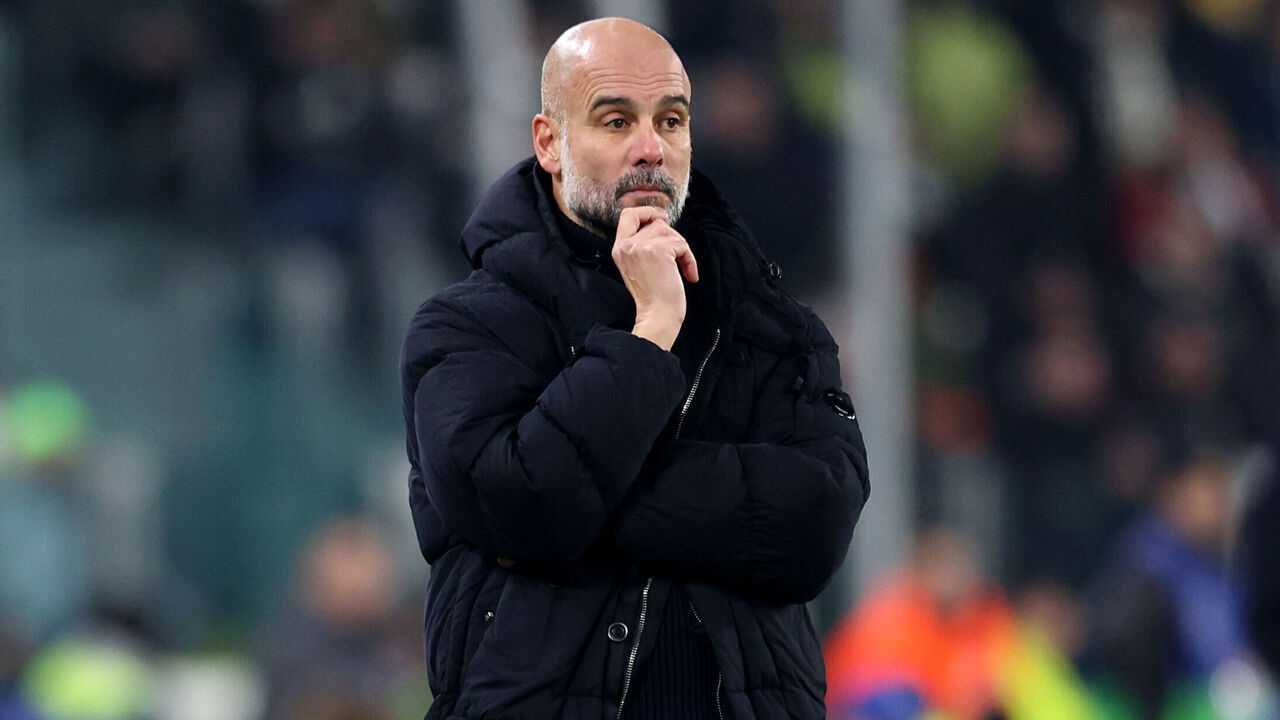 TURIN, ITALY - DECEMBER 11: Pep Guardiola, Manager of Manchester City, looks on during the UEFA Champions League 2024/25 League Phase MD6 match between Juventus and Manchester City at Juventus Stadium on December 11, 2024 in Turin, Italy.