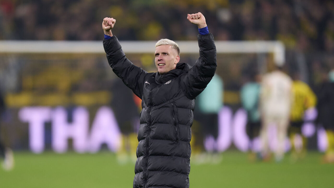 DORTMUND, GERMANY - DECEMBER 11: Dani Olmo of FC Barcelona celebrates victory after the UEFA Champions League 2024/25 League Phase MD6 match between Borussia Dortmund and FC Barcelona at Signal Iduna Park on December 11, 2024 in Dortmund, Germany.