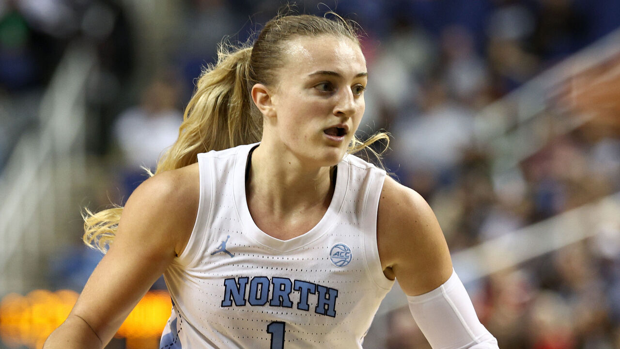 GREENSBORO, NORTH CAROLINA - NOVEMBER 15: Alyssa Ustby #1 of the North Carolina Tar Heels dribbles during the first half of the game against the UConn Huskies at First Horizon Coliseum on November 15, 2024 in Greensboro, North Carolina.