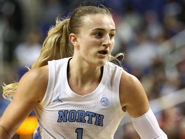 GREENSBORO, NORTH CAROLINA - NOVEMBER 15: Alyssa Ustby #1 of the North Carolina Tar Heels dribbles during the first half of the game against the UConn Huskies at First Horizon Coliseum on November 15, 2024 in Greensboro, North Carolina.