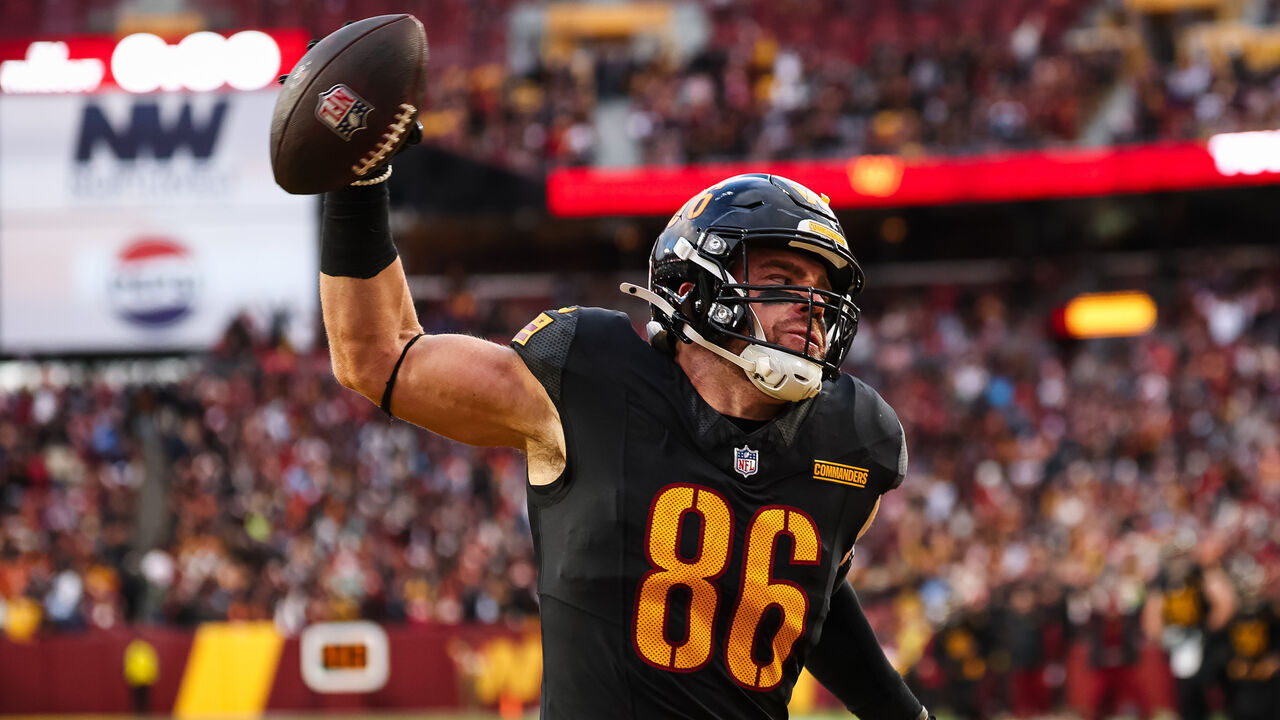 LANDOVER, MD - DECEMBER 01: Zach Ertz #86 of the Washington Commanders reacts after catching a pass for a touchdown against the Tennessee Titans during the second half of the game at Northwest Stadium on December 1, 2024 in Landover, Maryland.