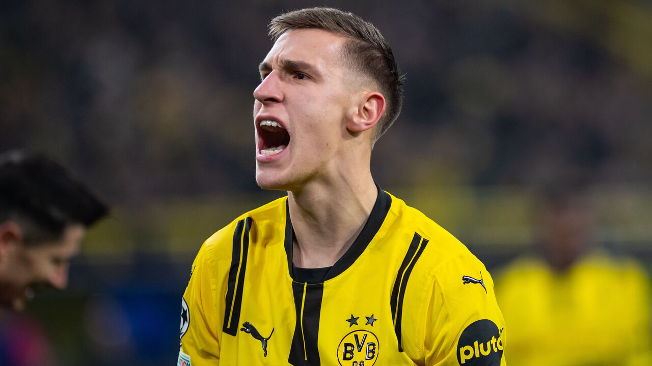 DORTMUND, GERMANY - DECEMBER 11: Nico Schlotterbeck of Dortmund reacts during the UEFA Champions League 2024/25 League Phase MD6 match between Borussia Dortmund and FC Barcelona at BVB Stadion Dortmund in Dortmund, Germany on December 11, 2024.