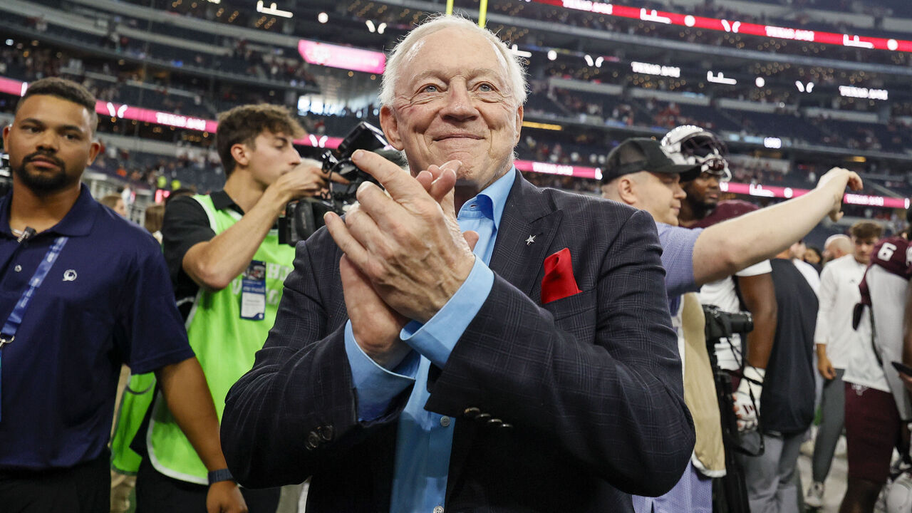 ARLINGTON, TX - SEPTEMBER 28: Dallas Cowboys owner and GM Jerry Jones applauds the Texas A&M Aggies band after the Southwest Classic game between the Arkansas Razorbacks and the Texas A&M Aggies on September 28, 2024 at AT&T Stadium in Arlington, Texas.