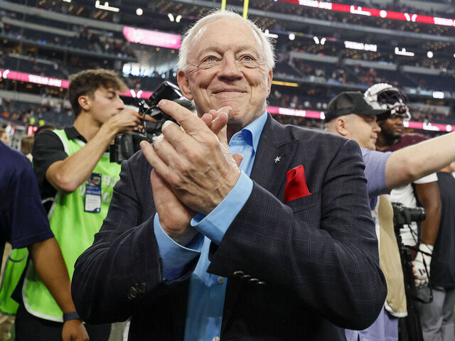 ARLINGTON, TX - SEPTEMBER 28: Dallas Cowboys owner and GM Jerry Jones applauds the Texas A&M Aggies band after the Southwest Classic game between the Arkansas Razorbacks and the Texas A&M Aggies on September 28, 2024 at AT&T Stadium in Arlington, Texas.