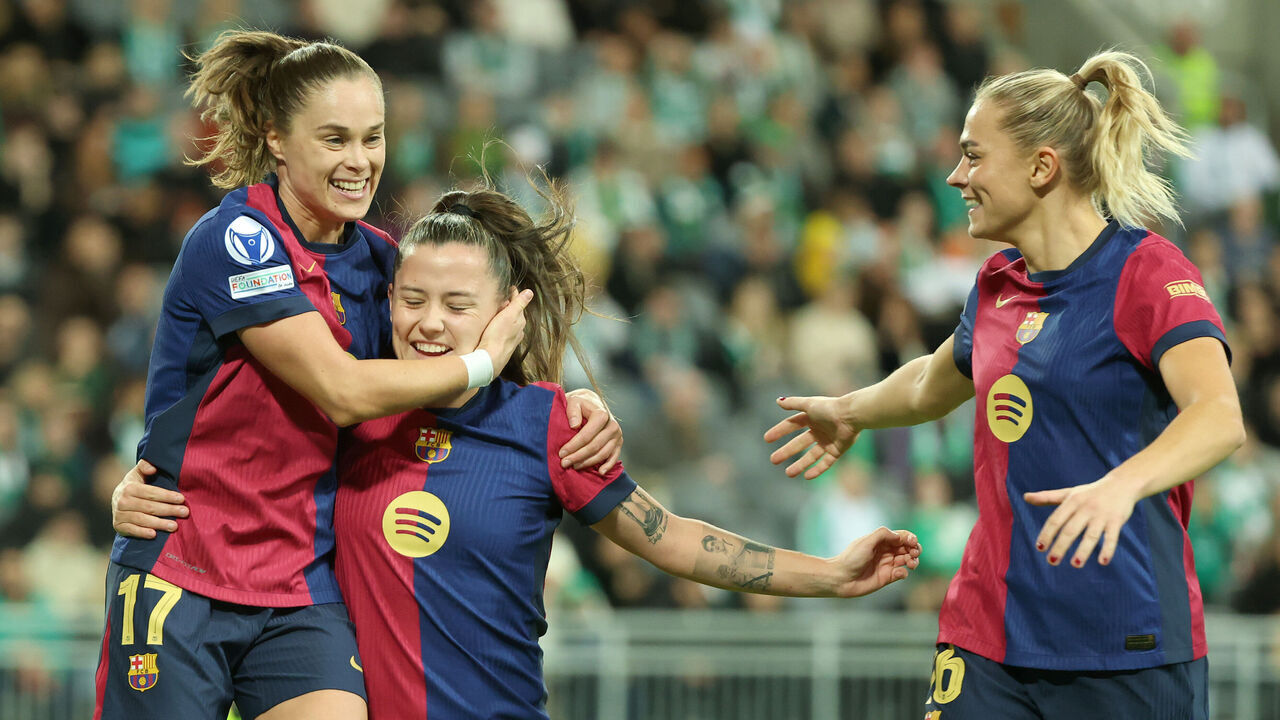 STOCKHOLM, SWEDEN - DECEMBER 12: Ewa Pajor of FC Barcelona celebrates scoring her team's first goal with teammates Claudia Pina and Fridolina Rolfoe during the UEFA Women's Champions League match between Hammarby IF and FC Barcelona at Stockholm Arena on December 12, 2024 in Stockholm, Sweden.