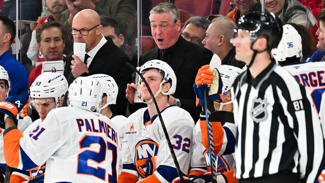 MONTREAL, CANADA - DECEMBER 03: Head coach Patrick Roy of the New York Islanders handles bench duties during overtime against the Montreal Canadiens at the Bell Centre on December 3, 2024 in Montreal, Quebec, Canada. The Montreal Canadiens defeated the New York Islanders 2-1 in overtime.