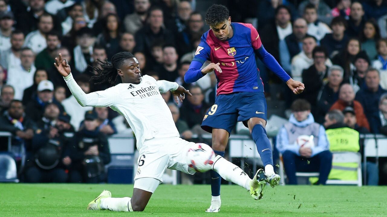 Eduardo Camavinga L of Real Madrid vies with Lamine Yamal of FC Barcelona during the La Liga football match between Real Madrid and FC Barcelona in Santiago Bernabeu stadium, Madrid, Spain, on Oct. 26, 2024.