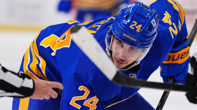 BUFFALO, NEW YORK - DECEMBER 7: Buffalo Sabres center Dylan Cozens (24) looks on before a face-off against the Utah Hockey Club during the first period of an NHL game on December 7, 2024 at KeyBank Center in Buffalo, New York.