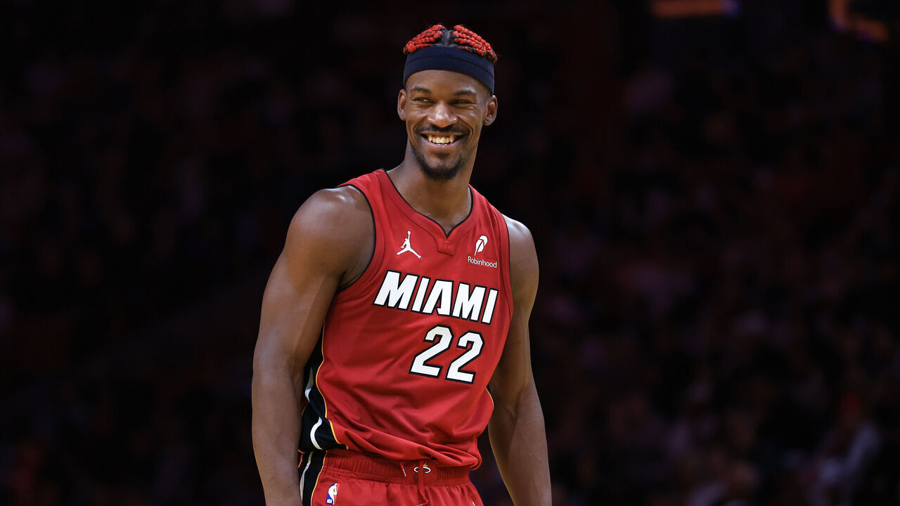 MIAMI, FLORIDA - NOVEMBER 29: Jimmy Butler #22 of the Miami Heat reacts against the Toronto Raptors during the second quarter of the Emirates NBA Cup at Kaseya Center on November 29, 2024 in Miami, Florida.