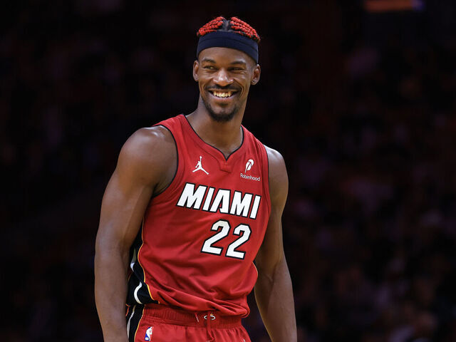 MIAMI, FLORIDA - NOVEMBER 29: Jimmy Butler #22 of the Miami Heat reacts against the Toronto Raptors during the second quarter of the Emirates NBA Cup at Kaseya Center on November 29, 2024 in Miami, Florida.