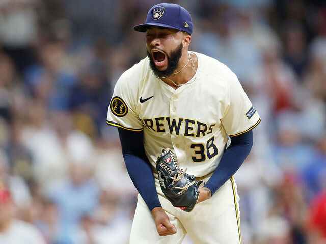 MILWAUKEE, WISCONSIN - SEPTEMBER 18: Devin Williams #38 of the Milwaukee Brewers reacts after a strike out in the ninth inning against the Philadelphia Phillies at American Family Field on September 18, 2024 in Milwaukee, Wisconsin.