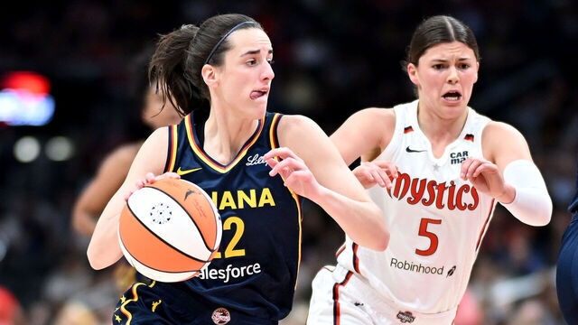 WASHINGTON, DC - SEPTEMBER 19: Caitlin Clark #22 of the Indiana Fever handles the ball against Jade Melbourne #5 of the Washington Mystics at Capital One Arena on September 19, 2024 in Washington, DC.