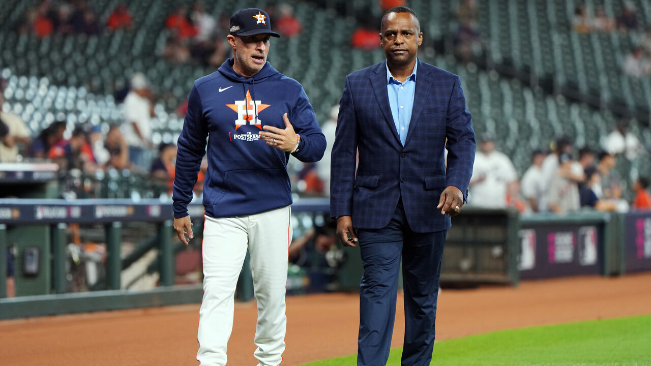 HOUSTON, TX - OCTOBER 01: Manager Joe Espada #19 of the Houston Astros talks with Astros General Manager Dana Brown prior to Game 1 of the Wild Card Series presented by T-Mobile 5G Home Internet between the Detroit Tigers and the Houston Astros at Minute Maid Park on Tuesday, October 1, 2024 in Houston, Texas.