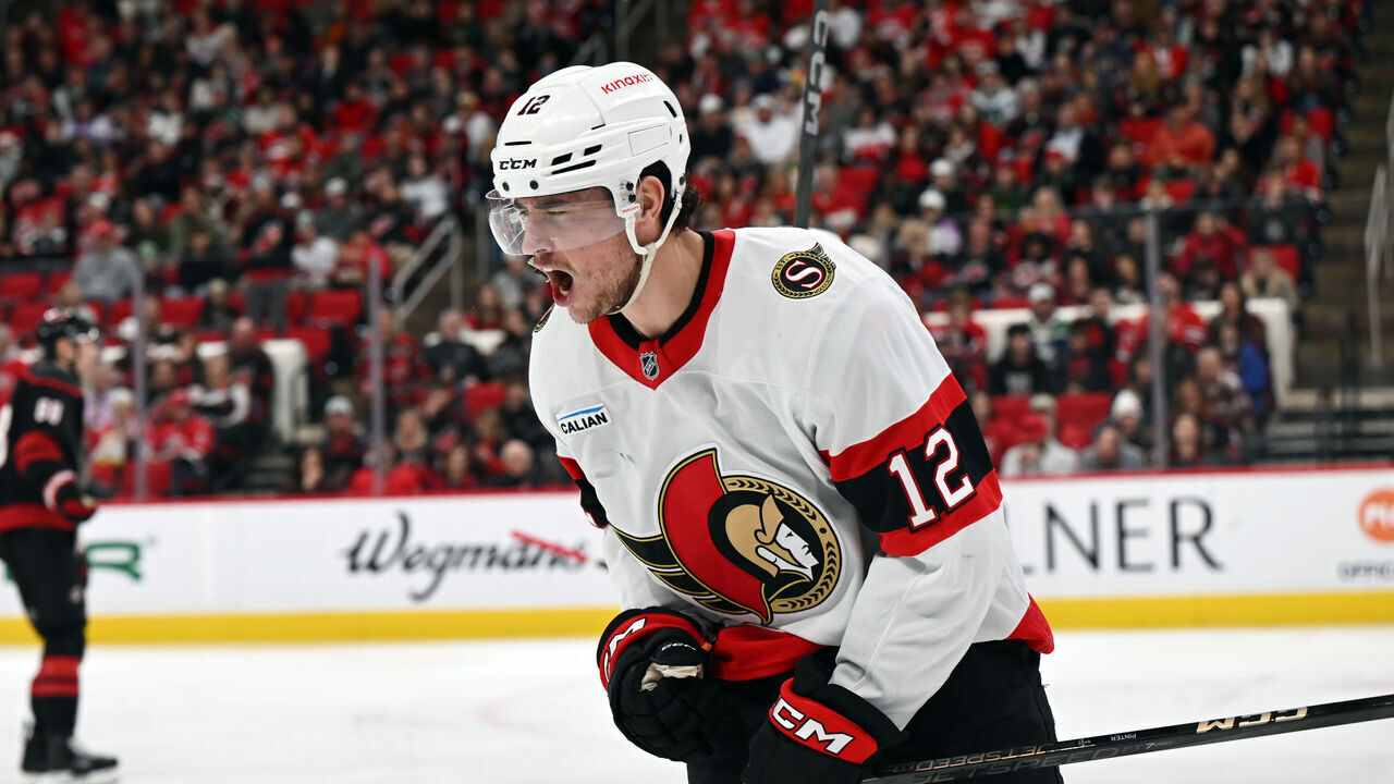 RALEIGH, NC - DECEMBER 13: Ottawa Senators center Shane Pinto (12) celebrates scoring during the NHL game between the Ottawa Senators and the Carolina Hurricanes on December 13, 2024 at Lenovo Center in Raleigh, North Carolina.